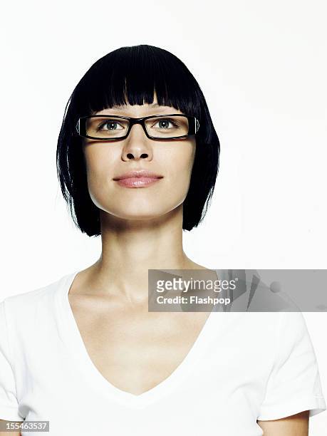 portrait of woman wearing glasses - plain tshirt stock pictures, royalty-free photos & images