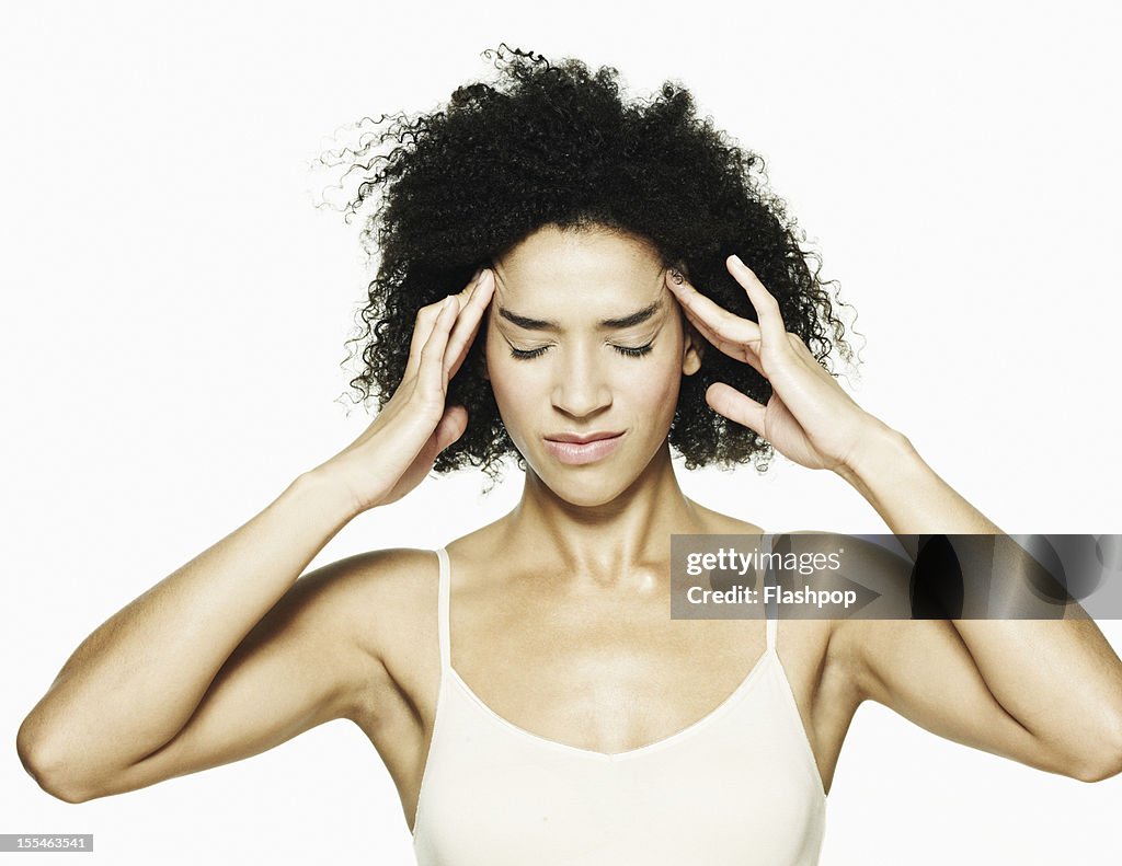 Portrait of woman with a headache