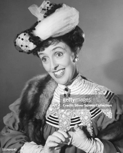 English comic actress Joyce Grenfell in Edwardian costume, circa 1955. THE MAGIC BOX?