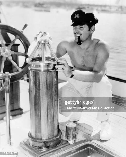 American actor Clark Gable on board a yacht, 1936.