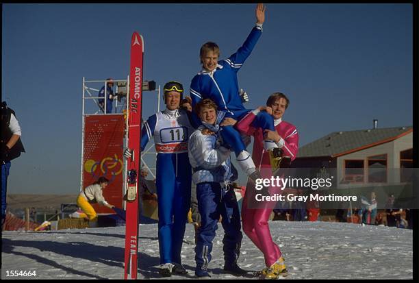 THE 90 METRE SKI JUMP TEAM FROM FINLAND CELEBRATE AFTER WINNING THE GOLD MEDAL AT THE 1988 CALGARY OLYMPICS. THE TEAM MEMBERS ARE MATTI NYKANEN,...