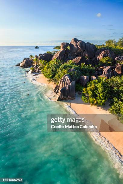 aerial view of anse source d' argent beach, seychelles - seychellen stock-fotos und bilder