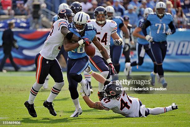 Charles Tillman of the Chicago Bears causes Kenny Britt of the Tennessee Titans to fumble at LP Field on November 4, 2012 in Nashville, Tennessee.