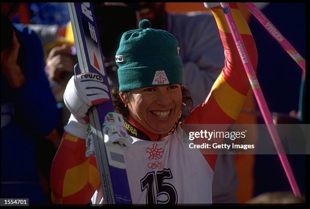 VRENI SCHNEIDER OF SWITZERLAND PUNCHES THE AIR AS SHE DISCOVERS THAT SHE HAS WON THE WOMENS GIANT SLALOM EVENT AT THE 1988 WINTER OLYMPICS. SCHNEIDER...