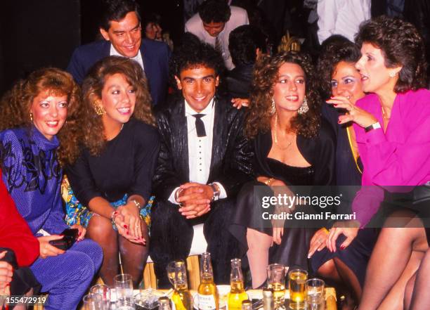 The Mexican soccer player Hugo Sanchez of Real Madrid with a group of women at a party Madrid, Castilla La Mancha, Spain.