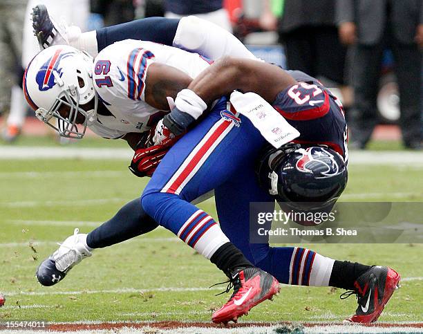 Buffalo Bills wide receiver Donald Jones is tackled by Houston Texans linebacker Bradie James on November 4, 2012 at Reliant Stadium in Houston,...