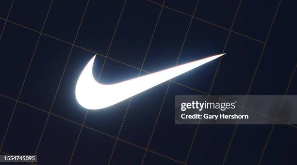 Nike corporate logo hangs above the entrance of their store in Brookfield Place on July 17 in New York City.