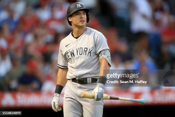 Anthony Volpe of the New York Yankees looks on after striking out during the fifth inning of a game against the Los Angeles Angels at Angel Stadium...