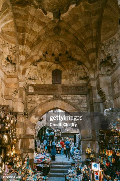 life at khan al-khalili souq in cairo - cairo stock pictures, royalty-free photos & images