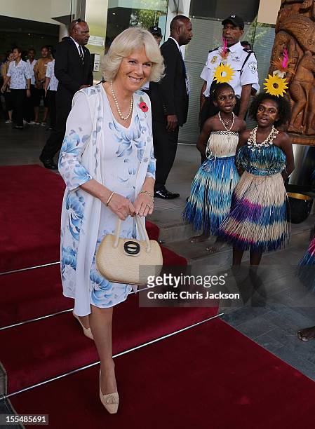 Camilla, Duchess of Cornwall is sung to by dancers as she leaves the Airways Hotel on November 4, 2012 in Port Moresby, Papua New Guinea. The Royal...