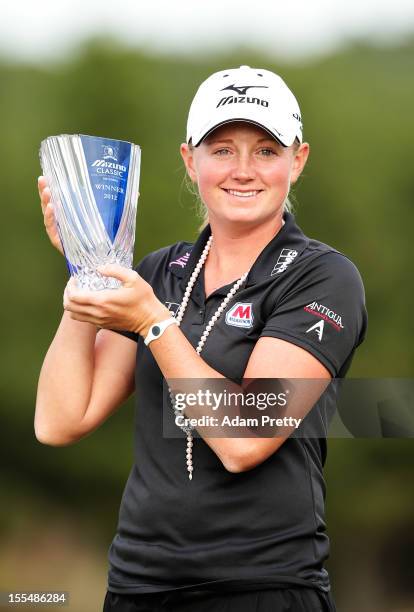 Stacy Lewis of the USA poses with the trophy after victory in the Mizuno Classic at Kintetsu Kashikojima Country Club on November 4, 2012 in Shima,...