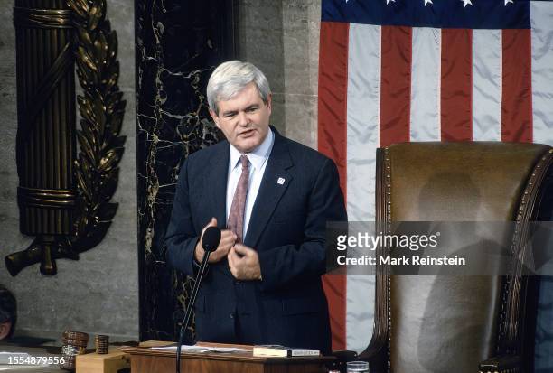 Speaker of the House Newt Gingrich stands at the speakers podium as he presides over opening day of the 104th Congress Washington DC, January 4, 1995