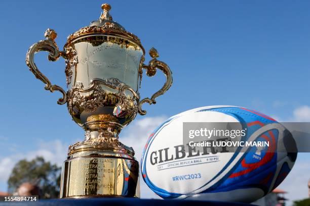 The Webb Ellis Cup trophy and the Gilbert Rugby World Cup 2023 Rugby ball are pictured ahead of French President Emmanuel Macron's visit to the...