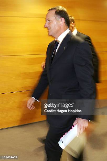 New Zealand Prime Minister John Key leave a press conference at The Beehive, New Zealand Parliament Buildings on November 5, 2012 in Wellington, New...