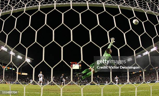 Goalkeeper Jon Busch of the San Jose Earthquakes can't make the save as the ball rebounds off the crossbar but doesn't go into the net from a shot by...