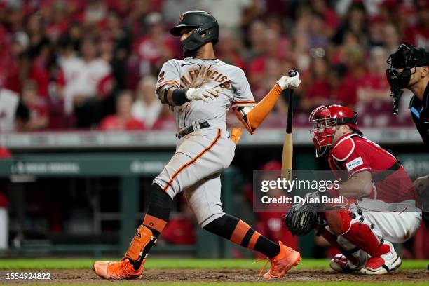 Luis Matos of the San Francisco Giants hits a single in the seventh inning against the Cincinnati Reds at Great American Ball Park on July 18, 2023...