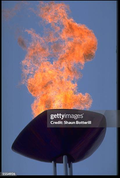 THE OLYMPIC FLAME SHOWN IN ALL ITS GLORY AT THE 1992 SUMMER OLYMPICS HELD IN BARCELONA SPAIN.