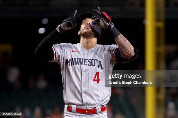 Carlos Correa of the Minnesota Twins celebrates his home run against the Seattle Mariners during the ninth inning at T-Mobile Park on July 18, 2023...