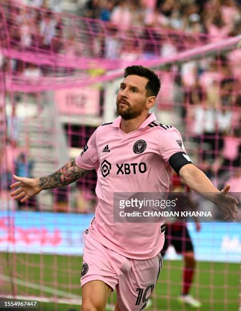 Inter Miami's Argentine forward Lionel Messi celebrates after scoring the team's first goal during the Leagues Cup football match between Inter Miami...