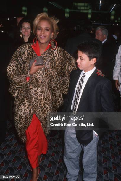Toukie Smith and son Raphael De Niro attend the premiere of We're No Angels on December 13, 1989 at Loew's Tower Theater in New York City.
