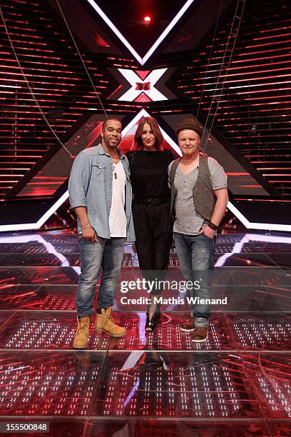 Willy Hubbard, Sarah Conner and Bjoern Paulsen attend the 'X-Factor' First Live Show on November 4, 2012 in Cologne, Germany.