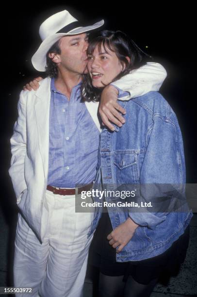 Actress Linda Fiorentino and date attend Tibet House Benefit on May 25, 1988 at Indochine Restaurant in New York City.