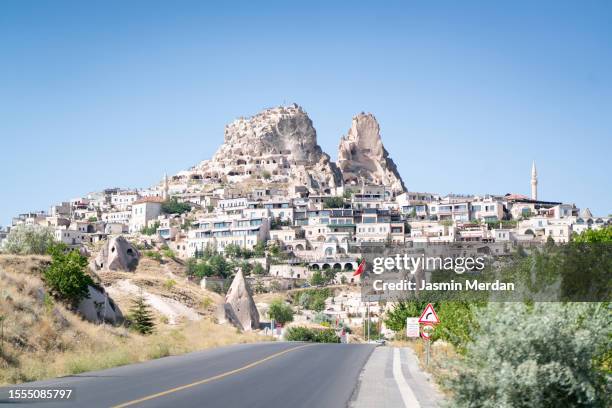 road leading to valley of cappadocia, turkey - göreme stock pictures, royalty-free photos & images