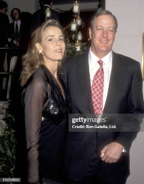 Businessman David H. Koch and guest Julia Flesher attend An Evening of Fashion by Celine - Benefit for Gods Love We Deliver on May 23, 1995 at City...