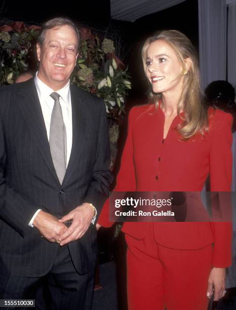 Businessman David H. Koch and wife Julia Flesher attend the International Fine Art and Antique Dealers Show on October 10, 1996 at Seventh Regiment...