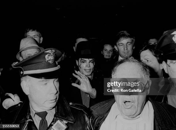 Singer Michael Jackson, businessman Donald Trump and public relations agent Lee Solters attend the grand opening of Trump Taj Mahal Casino on April...