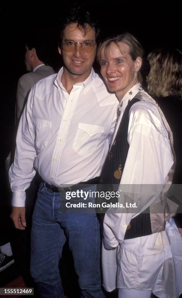 Actor Robert Carradine and wife Edie Mani attending the premiere of Sketch Artist on June 1, 1992 at The Academy Theater in Beverly Hills, California.