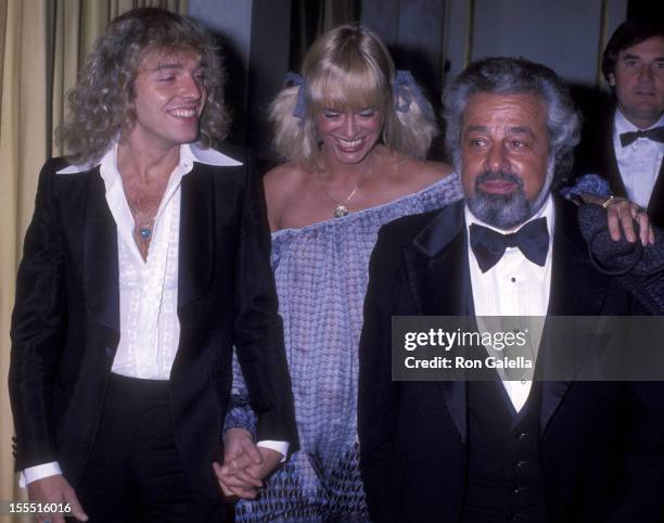 Musician Peter Frampton, Penny McCall and manager Dee Anthony attend the party honoring Clive Davis on February 24, 1978 at the Beverly Wilshire...