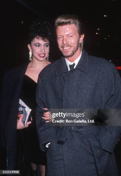 Musician David Bowie and date Melissa Hurley attends the performance of Metamorphosis on March 6, 1989 at the Barrymore Theater in New York City.