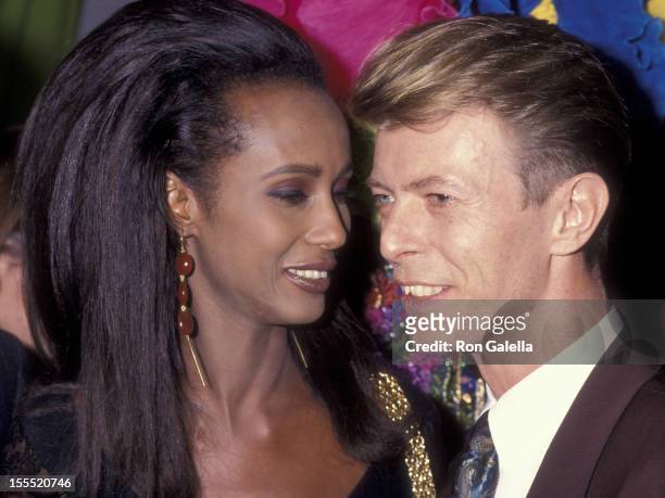 Musician David Bowie and model Iman attend Seventh on Sale AIDS Benefit on November 29, 1990 at the Armory in New York City.