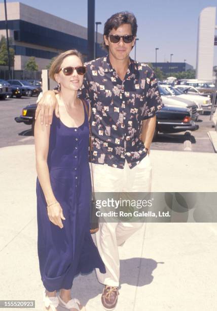 Actor Tim Matheson and wife Megan Murphy Matheson on June 23, 1990 arrive at the Los Angeles International Airport in Los Angeles, California.