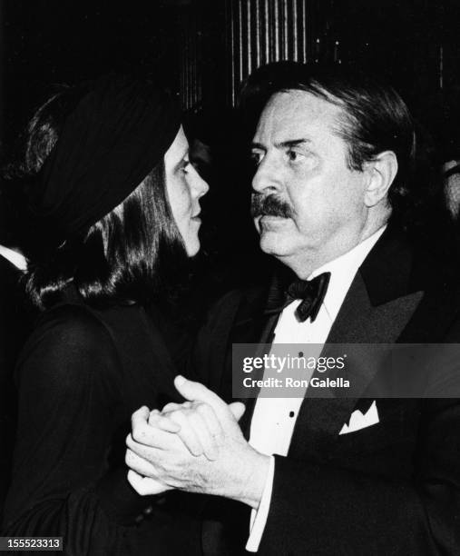 Producer David Merrick and wife Etan Aronson attend the premiere party for Jonathan Livingston Seagull on October 23, 1973 at the Waldorf Astoria...