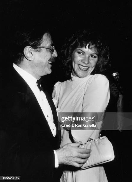 Producer David Merrick and wife Karen Prunczik attend the opening party for Cats on October 7, 1982 at the Waldorf Hotel in New York City.