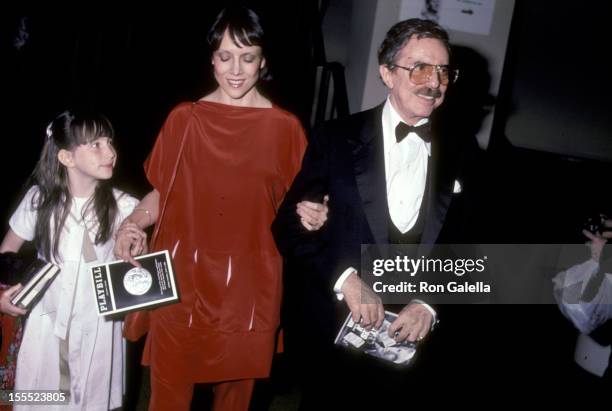 Producer David Merrick, wife Etan Aronson, and his daughter Celia Merrick attend the 37th Annual Tony Awards on June 5, 1983 at Uris Theatre in New...