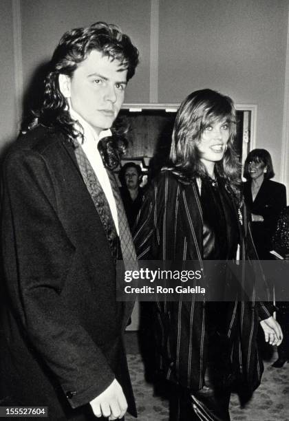 Musician John Taylor of Duran Duran and date Renee Simonsen attending 43rd Annual Golden Globe Awards on January 24, 1986 at the Beverly Hilton Hotel...