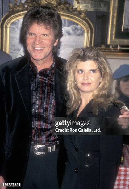 Musician John Fogerty and wife Julie Lebiedzinski attend the Fourth Annual Orville H. Gibson Awards on February 24, 1998 at The Hard Rock Cafe in New...