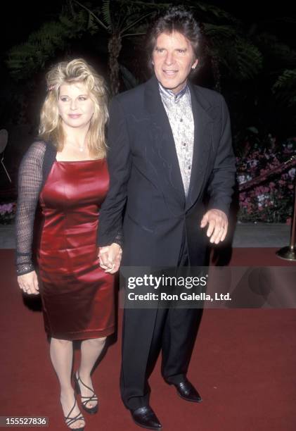 Musician John Fogerty and wife Julie Lebiedzinski attend the 41st Annual Grammy Awards Pre-Party hosted by Clive Davis and Arista Records on February...