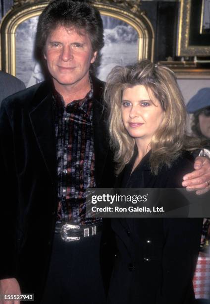 Musician John Fogerty and wife Julie Lebiedzinski attend the Fourth Annual Orville H. Gibson Awards on February 24, 1998 at The Hard Rock Cafe in New...