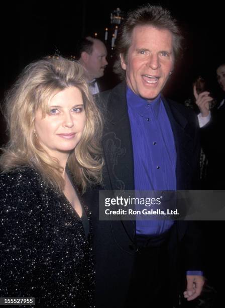 John Fogerty and wife Julie Lebiedzinski attend the 40th Annual Grammy Awards Pre-Party hosted by Clive Davis and Arista Records on February 24, 1998...