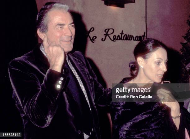Actor Gregory Peck and wife Veronique Peck on February 4, 1977 dine at Le Restaurant in Los Angeles, California.
