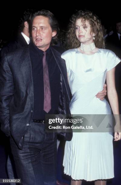 Actor Michael Douglas and wife Diandra Douglas attend the premiere of Ruthless People on June 24, 1986 at the Plitt Theaer in Century City,...