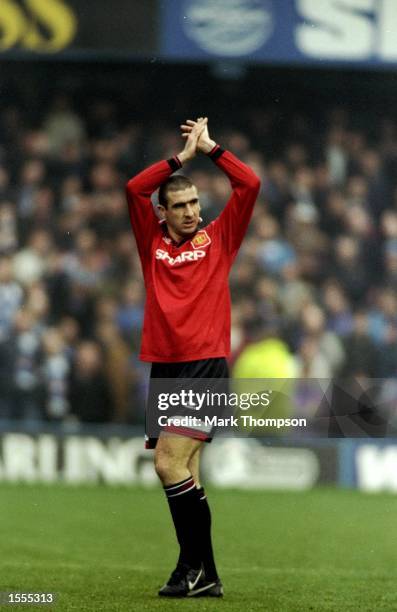 Eric Cantona of Manchester United applauds during an FA Carling Premiership match against Queens Park Rangers at Loftus Road in London. \ Mandatory...