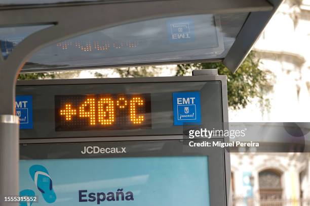 Digital thermometer reads 40 degrees Celsius at a bus-stop at the iconic Plaza de Cibeles on July 18, 2023 in Madrid, Spain. An area of high...