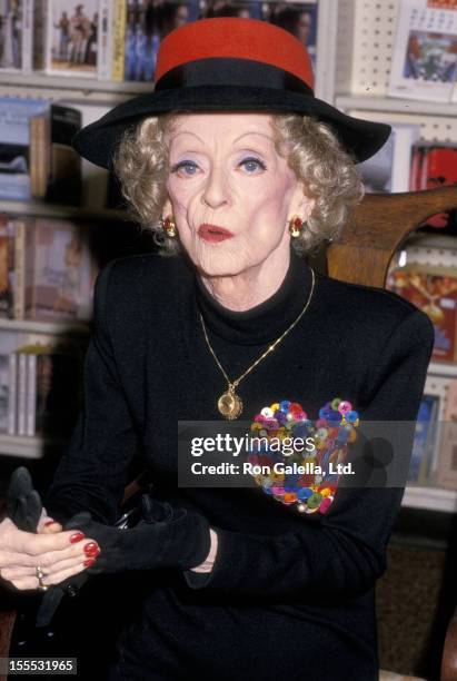 Actress Bette Davis signs copies of her book This 'N That on February 13, 1988 at B. Dalton Bookseller in Hollywood, California.