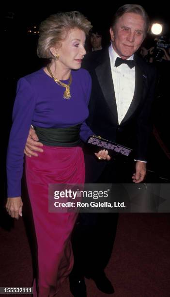 Actor Kirk Douglas and wife Anne Douglas attend the premiere of Scrooged on November 17, 1988 at Mann Chinese Theater in Hollywood, California.