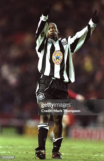 Faustino Asprilla of Newcastle United raises his arms during an FA Carling Premiership match against Middlesbrough at the Riverside Stadium in...